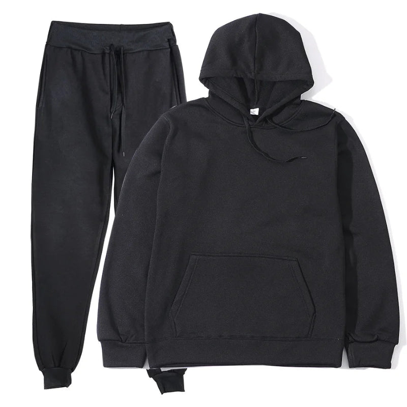 Black hoodie and pants set on a white background
