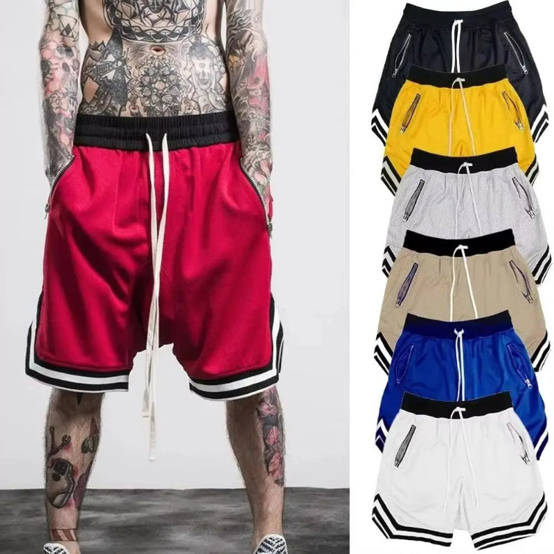 Red shorts with black waistband and white drawstring, displayed with other color options on a white background.