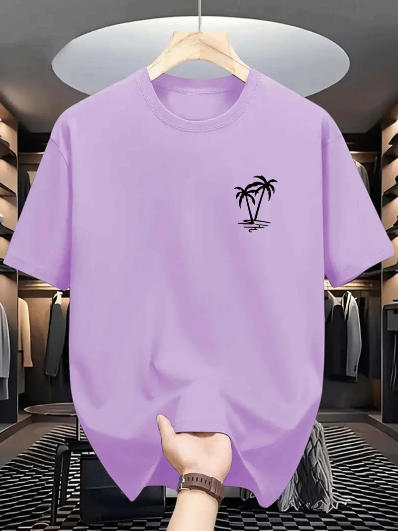 Purple t-shirt with a palm tree design held by a hand in a clothing store.
