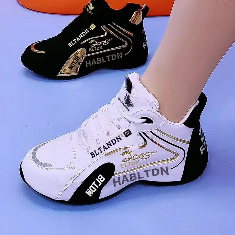 White sneakers with black accents and branding on a blue background