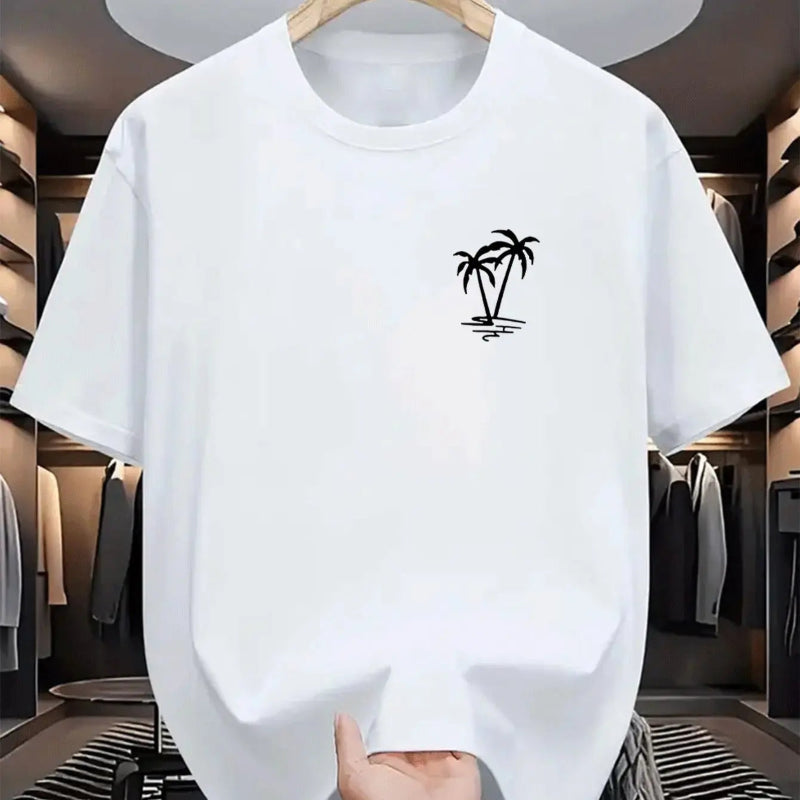 White t-shirt with a palm tree design on a hanger in a clothing store.