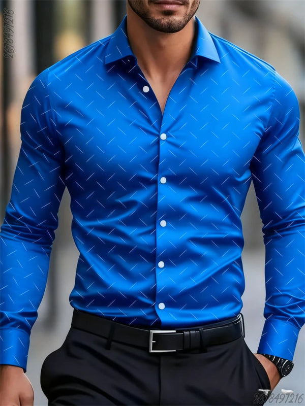 Man wearing a blue patterned shirt with a blurred background