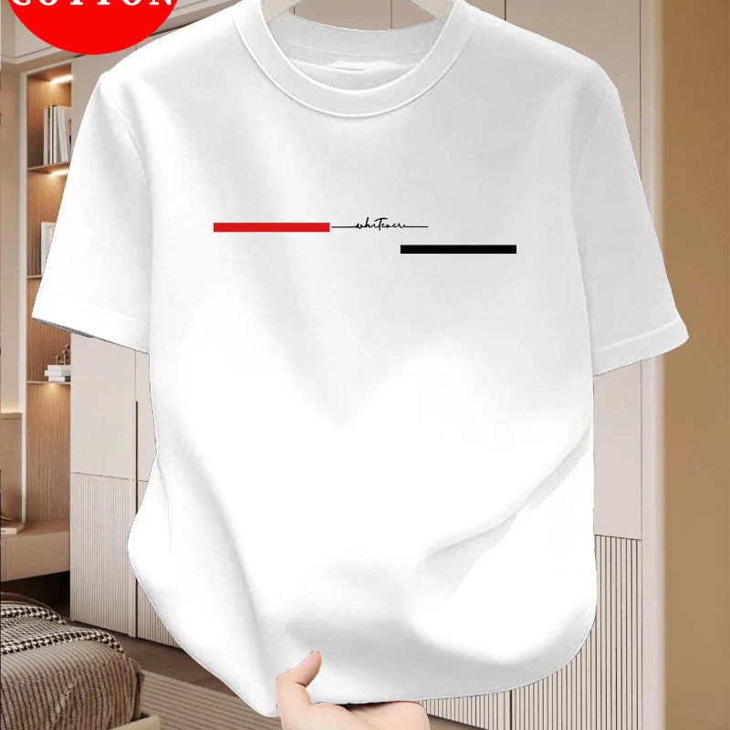 White t-shirt with red and black design held by a hand in a room setting
