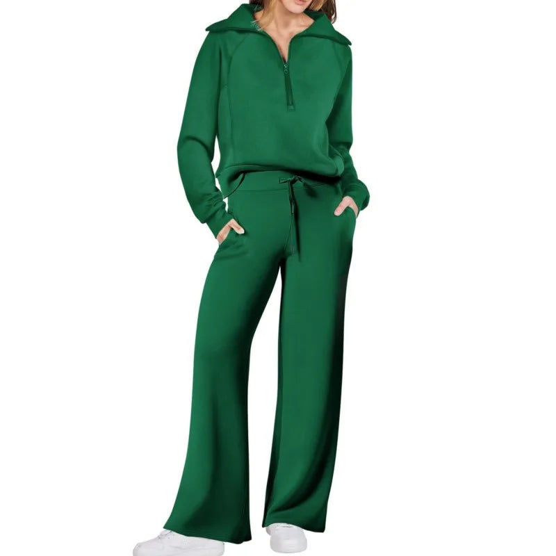 Green tracksuit worn by a person on a white background