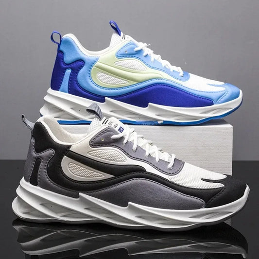 Two pairs of stylish sneakers on a reflective surface with a gray background