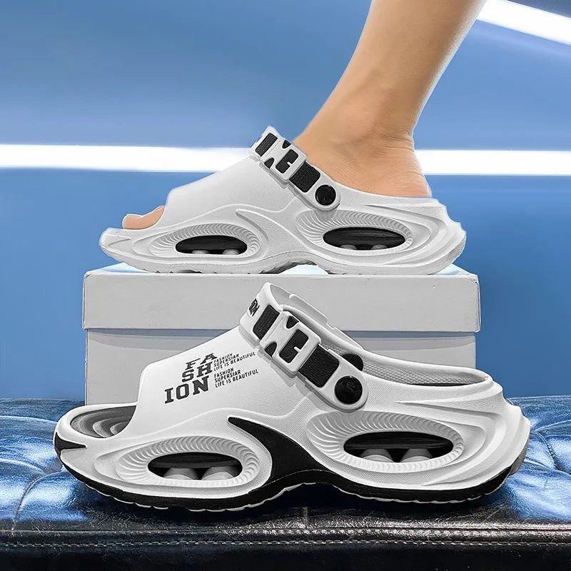 White sandals with black accents on a blue surface