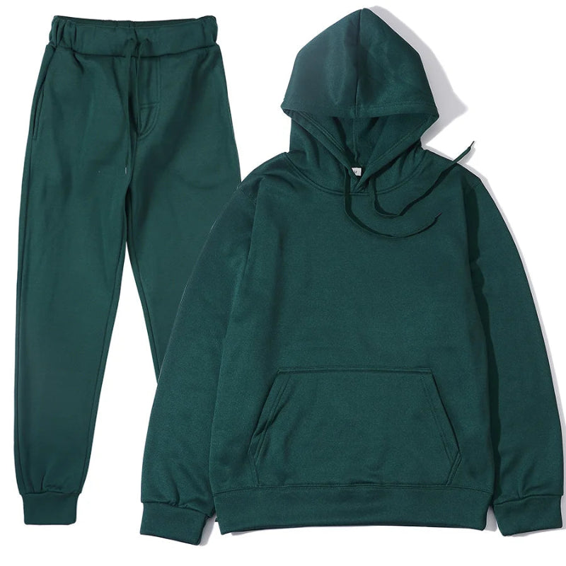 Green hoodie and jogger pants set on a white background