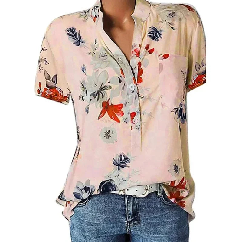 Floral patterned shirt worn by a person on a white background