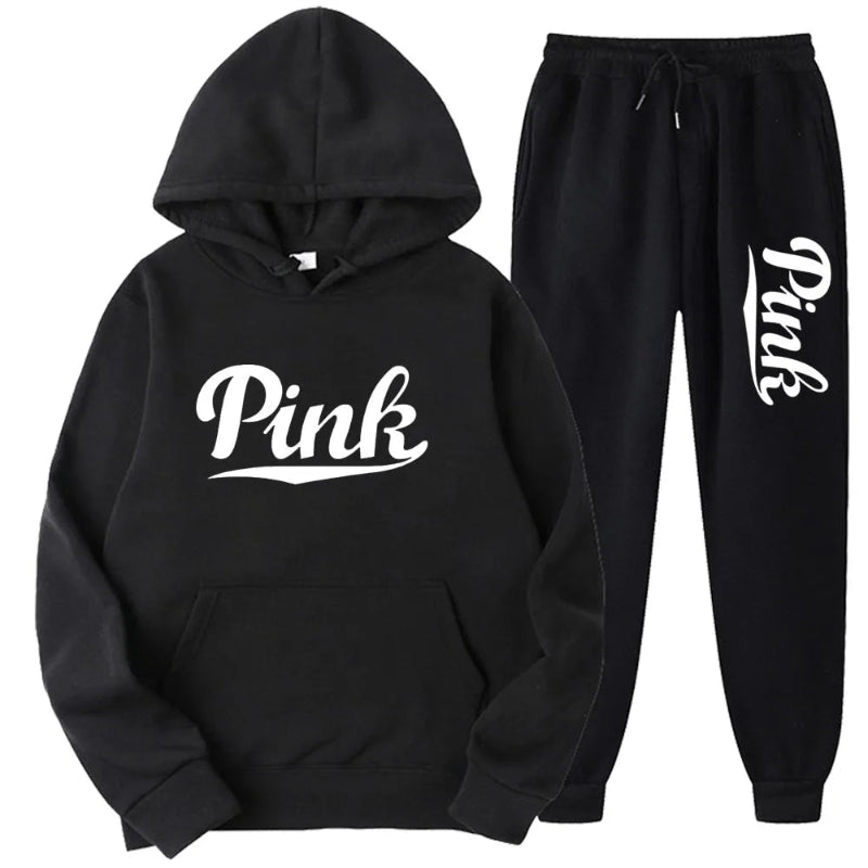 Black hoodie and jogger set with 'Pink' text on a white background
