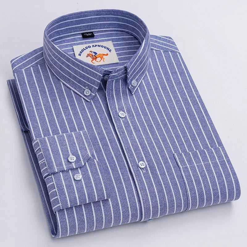 Folded blue and white striped shirt with a brand label on a light gray background