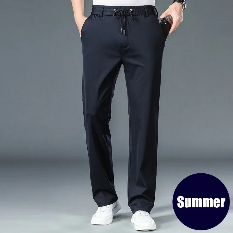 Person wearing dark blue pants with a 'Summer' label on a gray background
