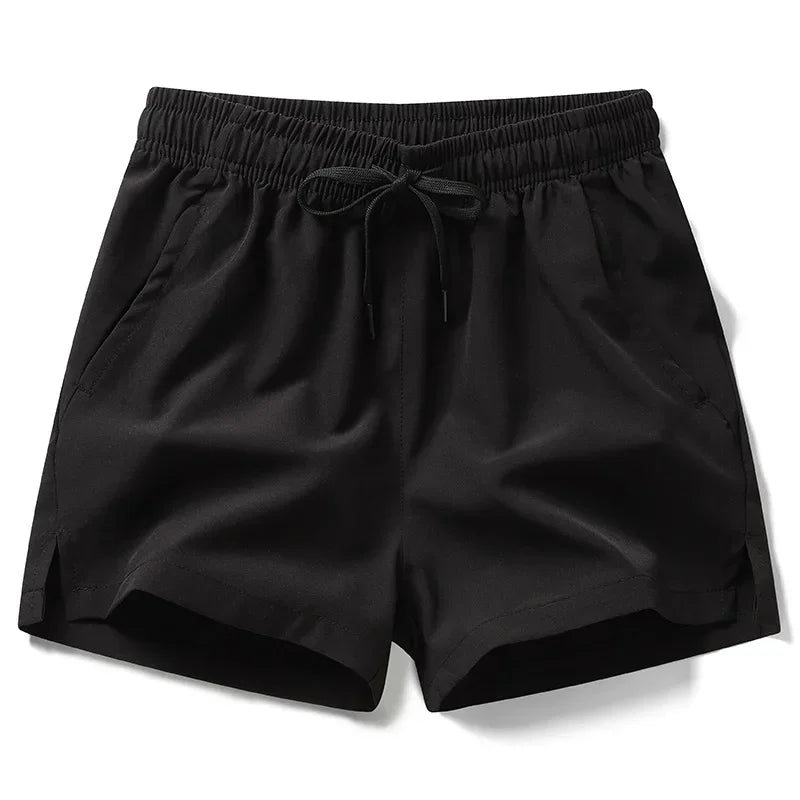 Black shorts with an elastic waistband on a white background