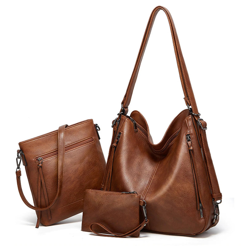 Brown leather handbag set with shoulder bag, crossbody bag, and pouch on a white background
