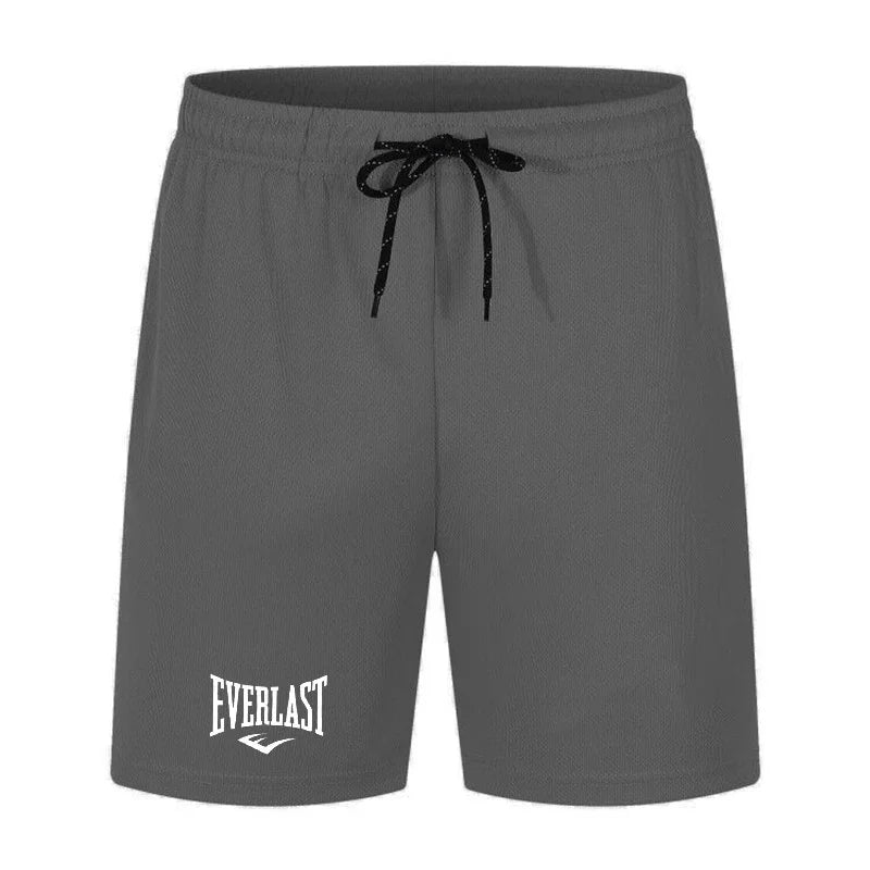 Gray shorts with a black drawstring and Everlast logo on a white background