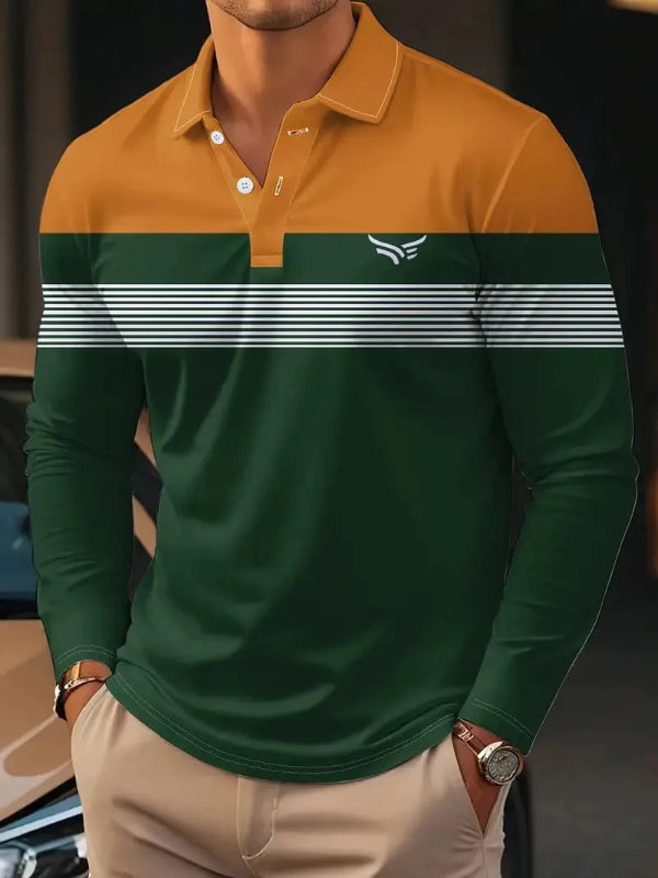 Green and orange long-sleeve polo shirt with a logo on a blurred background