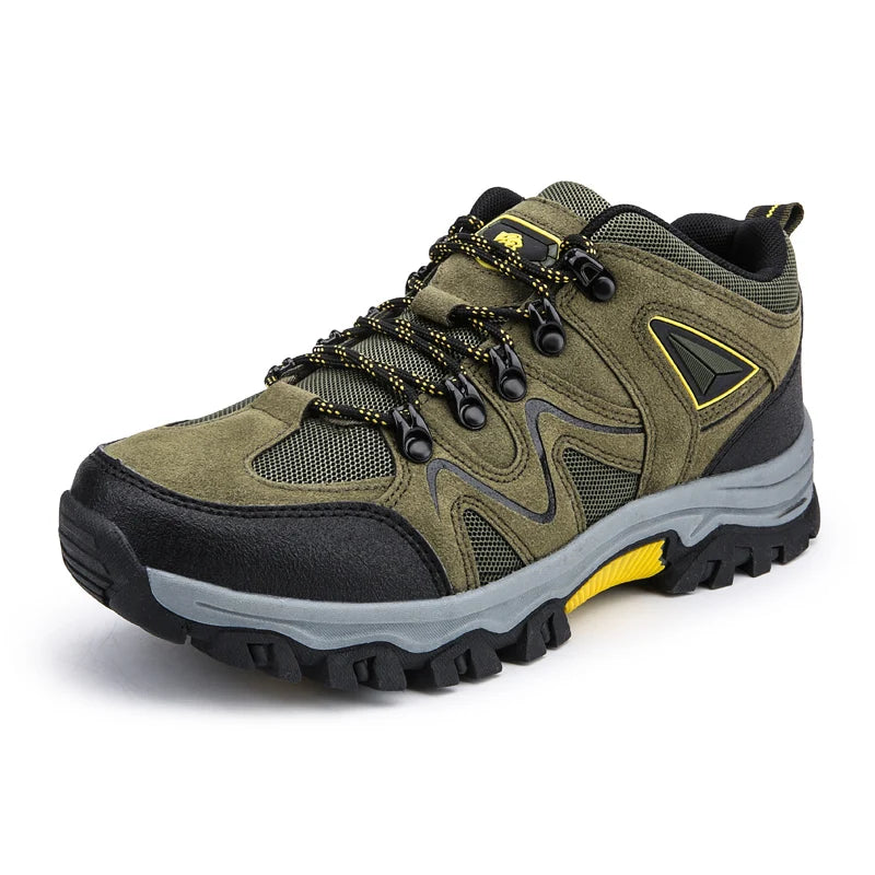 Green hiking shoe with black and gray accents on a white background