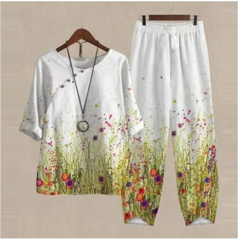 White t-shirt and pants with floral design on a beige background