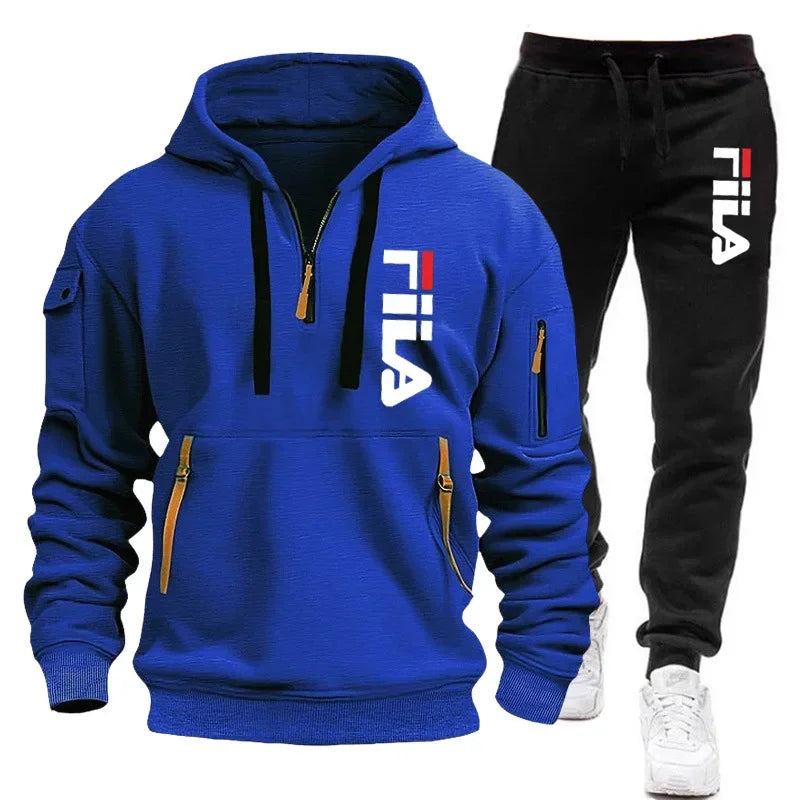 Blue hoodie and black pants with Fila logo on a white background