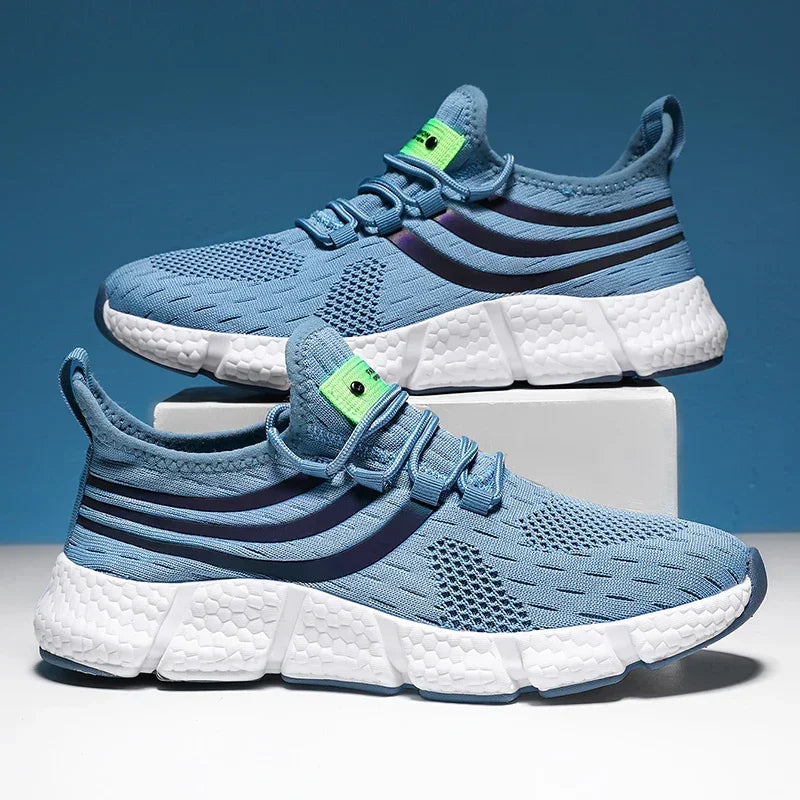 Blue athletic shoes with white soles on a blue background