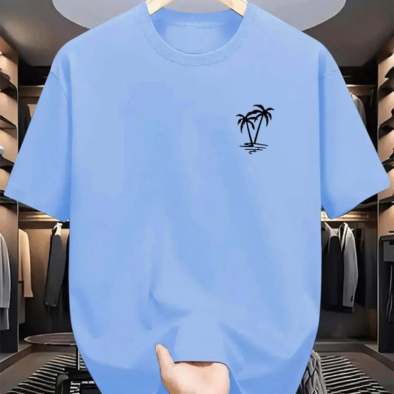 Blue t-shirt with a palm tree design on a hanger in a clothing store.