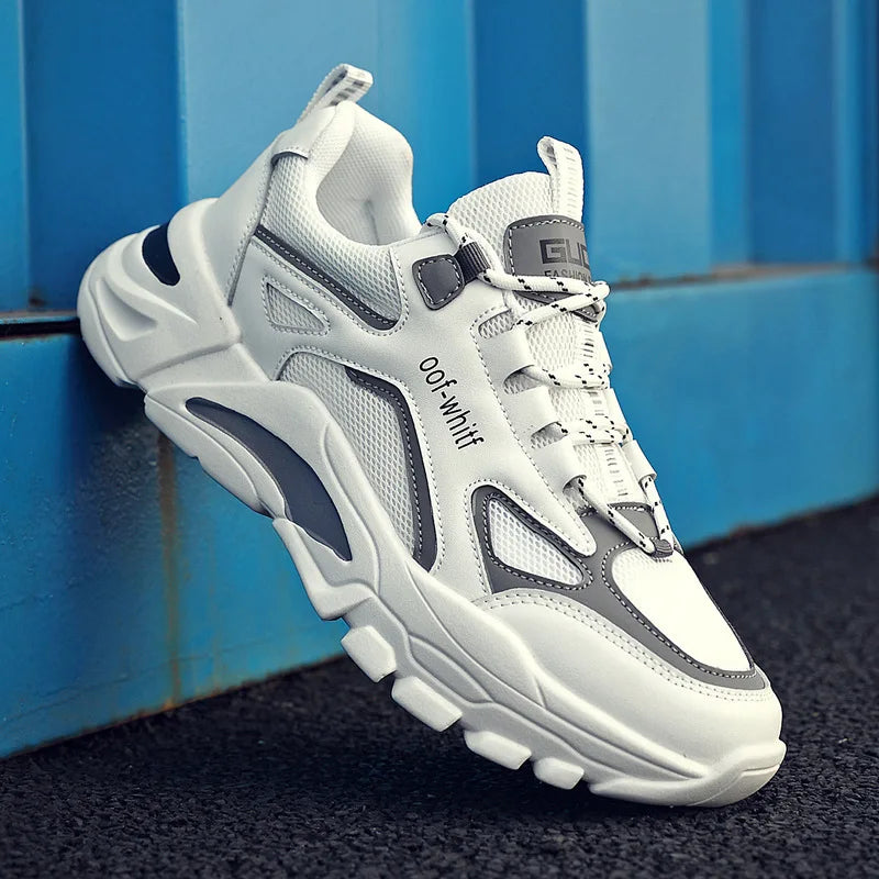 White and gray sneaker with 'ootwhiff' branding against a blue background