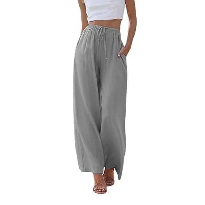 Gray wide-leg pants worn by a person on a white background