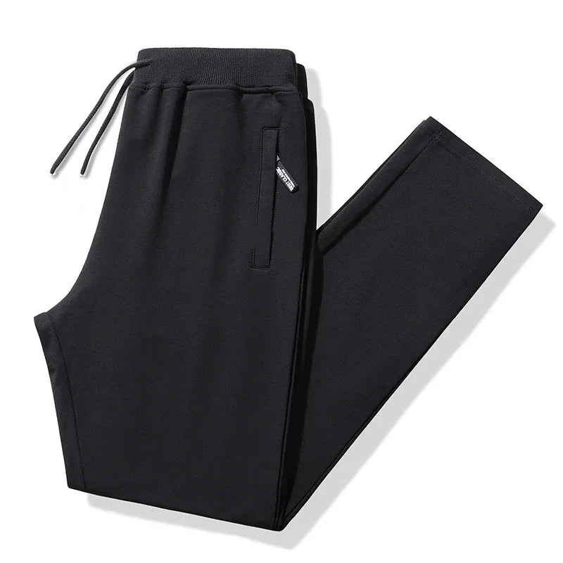 Black pants with drawstring on a white background
