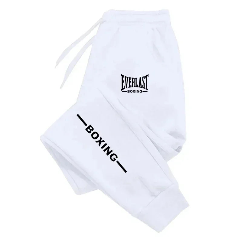 White boxing shorts with 'Everlast Boxing' logo on a white background