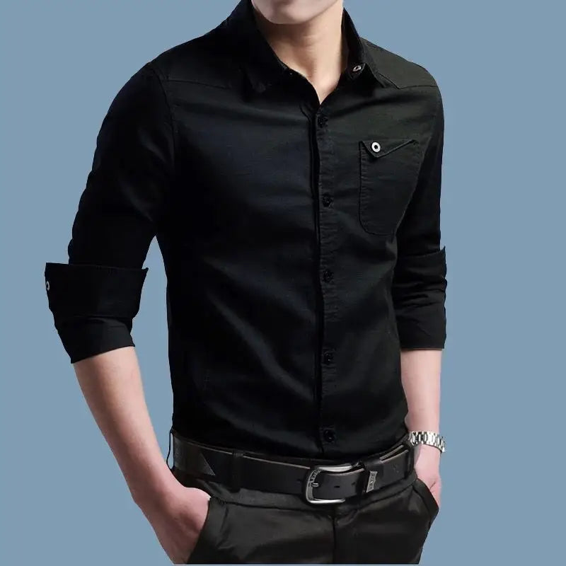 Black shirt worn by a person on a blue background