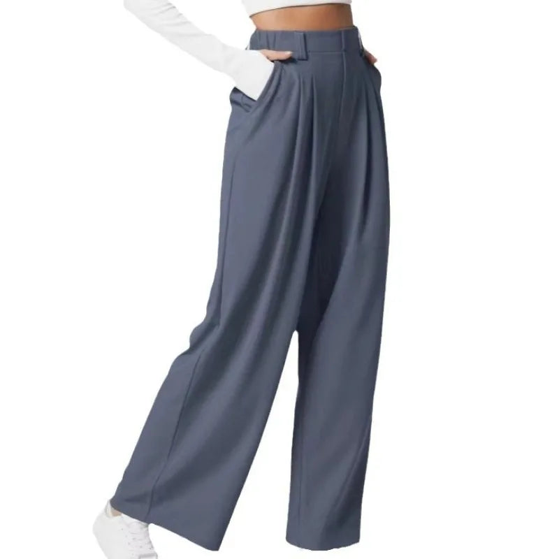 Gray wide-leg pants worn by a person on a white background