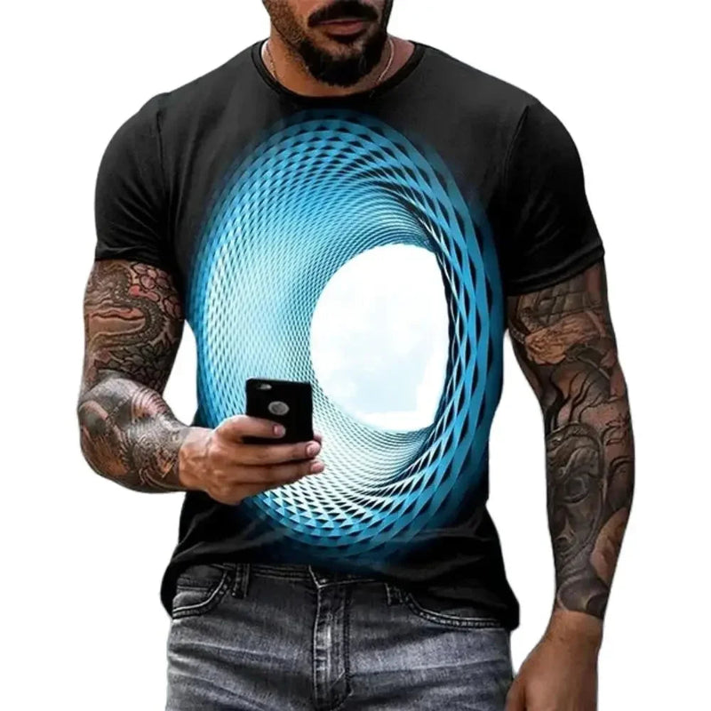 Man wearing a black t-shirt with a blue circular design, holding a phone.