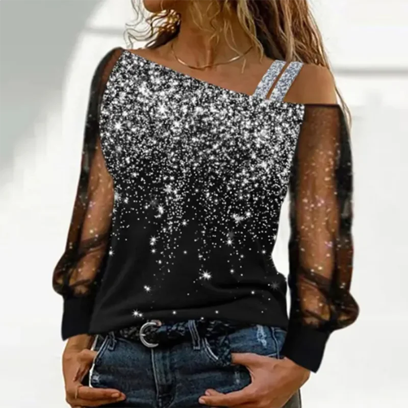 Black sequin top with sheer sleeves worn by a person on a white background