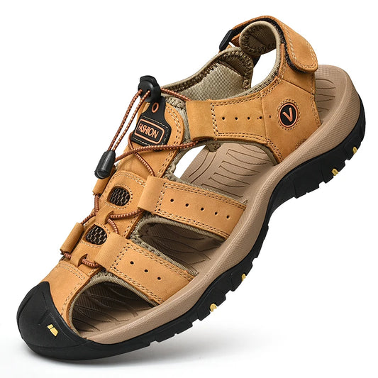 Tan sandal with black sole on a white background