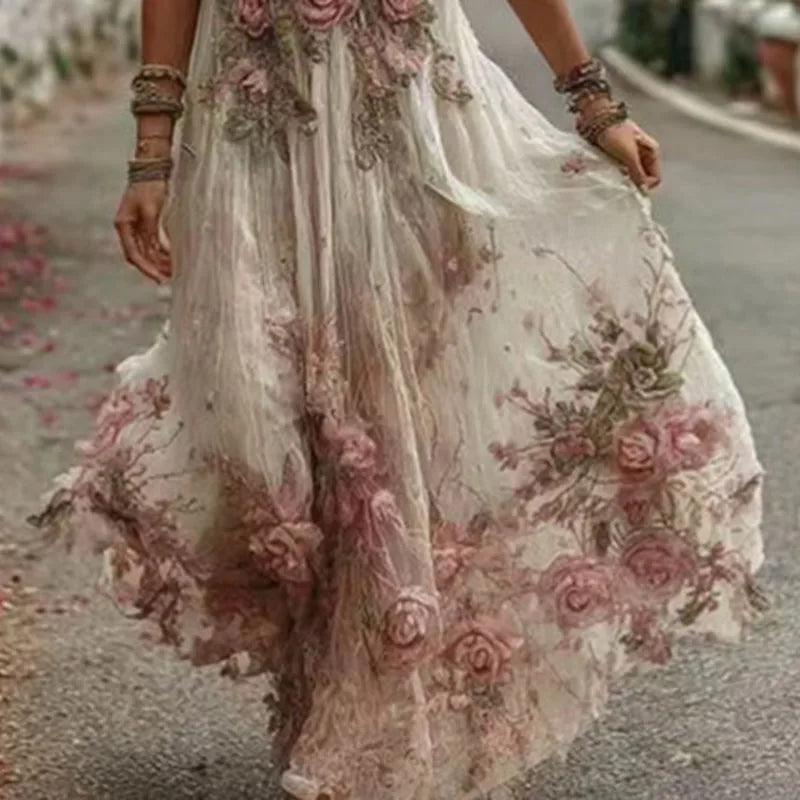 Floral dress with pink roses and green leaves on a blurred background
