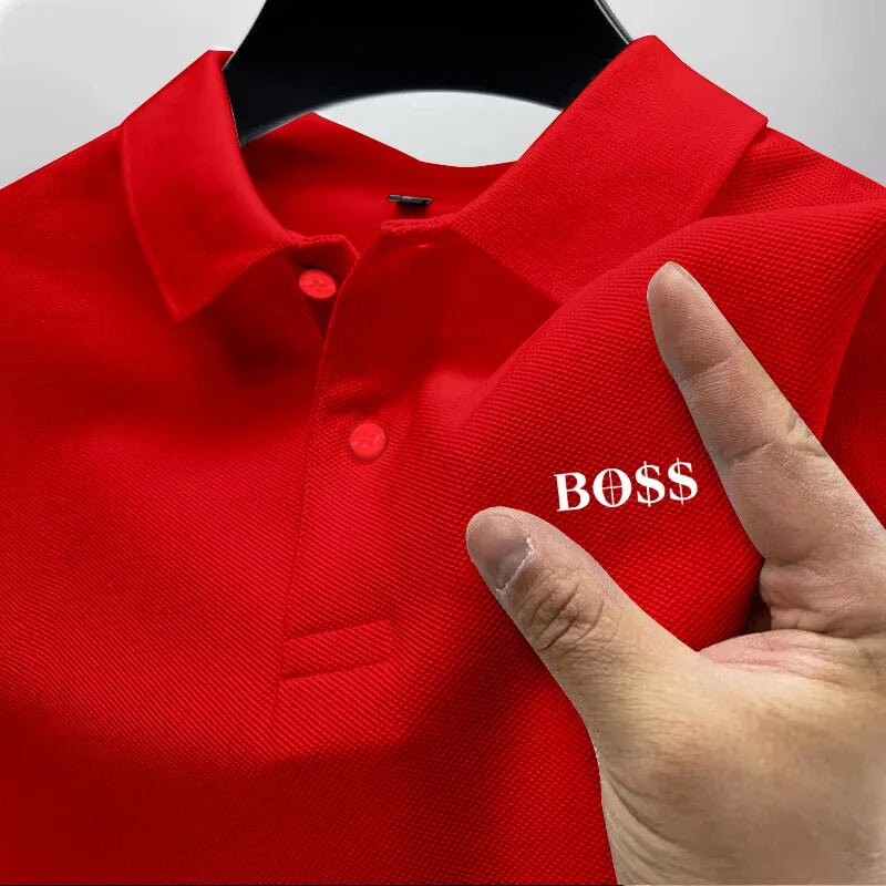 Red polo shirt with 'BOSS' text on a hanger, hand pointing to the text.