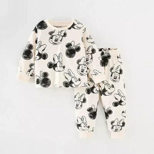 Children's pajama set with Minnie Mouse pattern on a white background