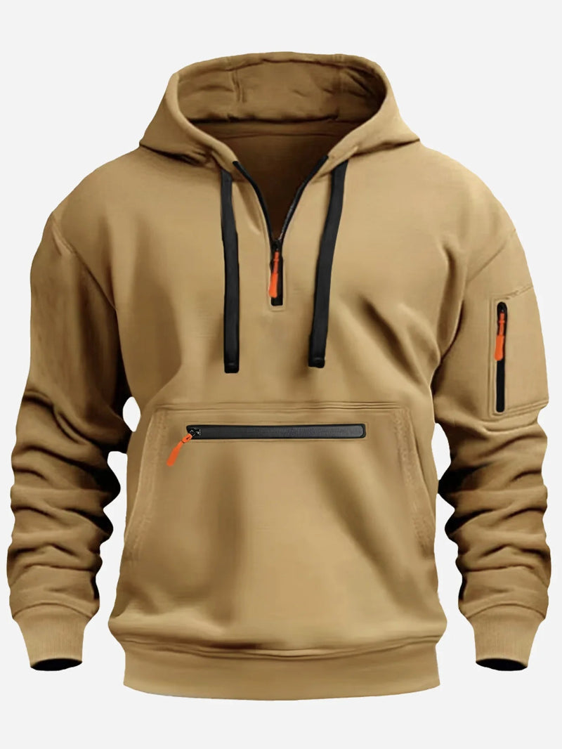 Beige hoodie with black and orange zippers on a white background