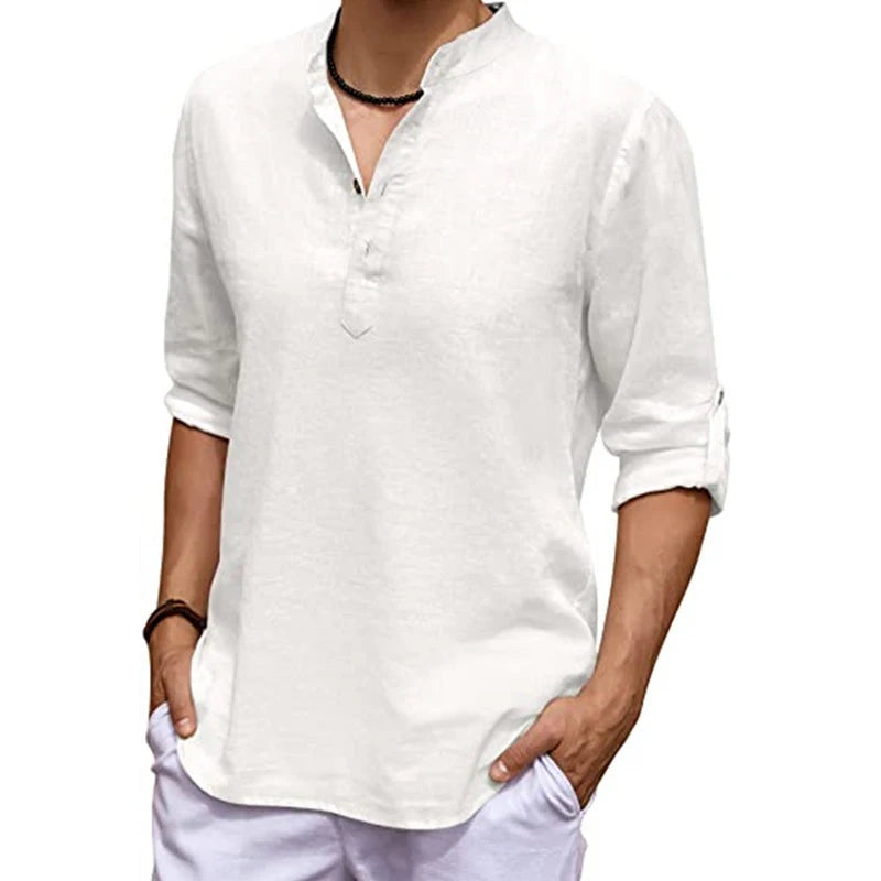 White long-sleeve shirt worn by a person on a white background