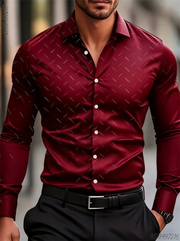 Man wearing a red patterned shirt with a blurred background