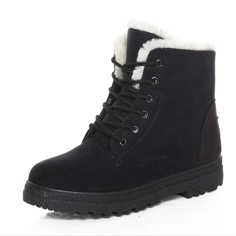 Black winter boot with white fur lining on a white background