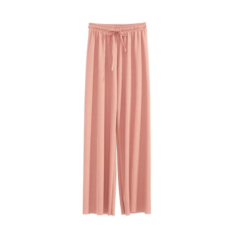 Pink pajama pants on a white background