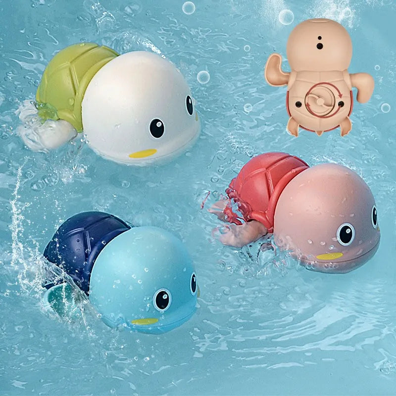 Four colorful rubber duck toys swimming in water