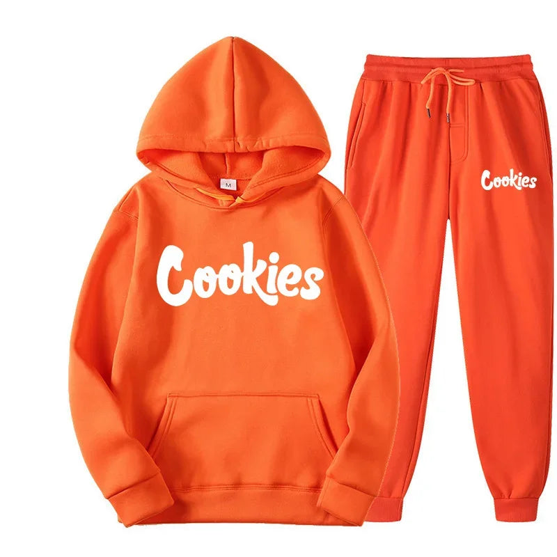 Orange hoodie and sweatpants set with 'Cookies' branding on a white background