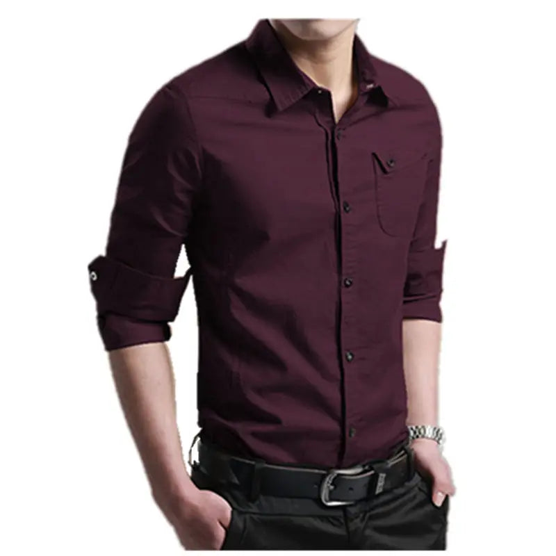Purple shirt worn by a person on a white background