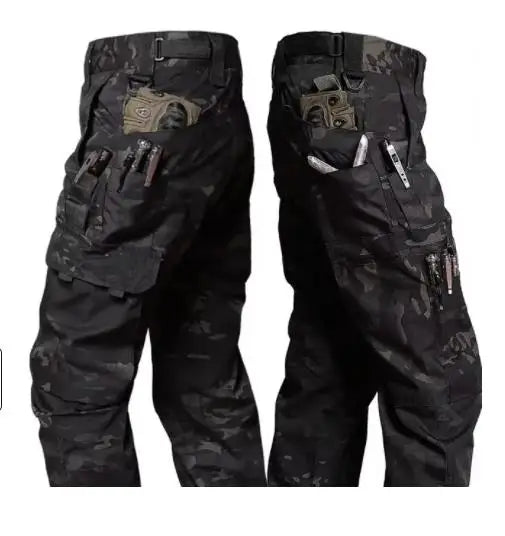 Black camouflage tactical pants with multiple pockets on a white background