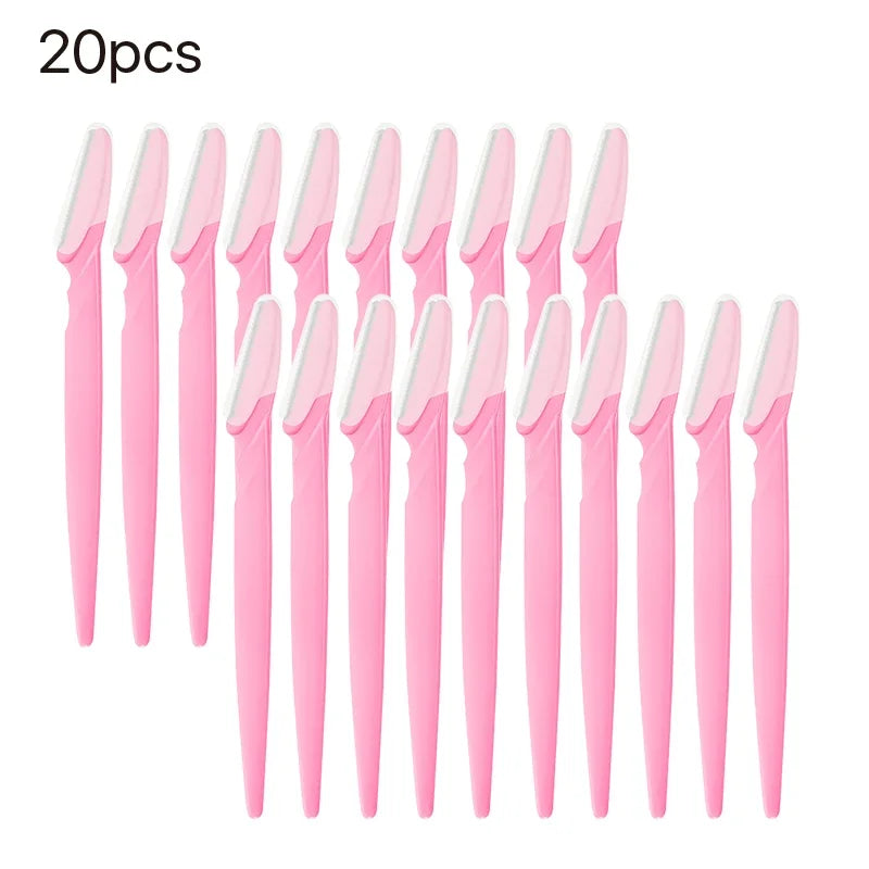 20 pink and white makeup brushes on a white background
