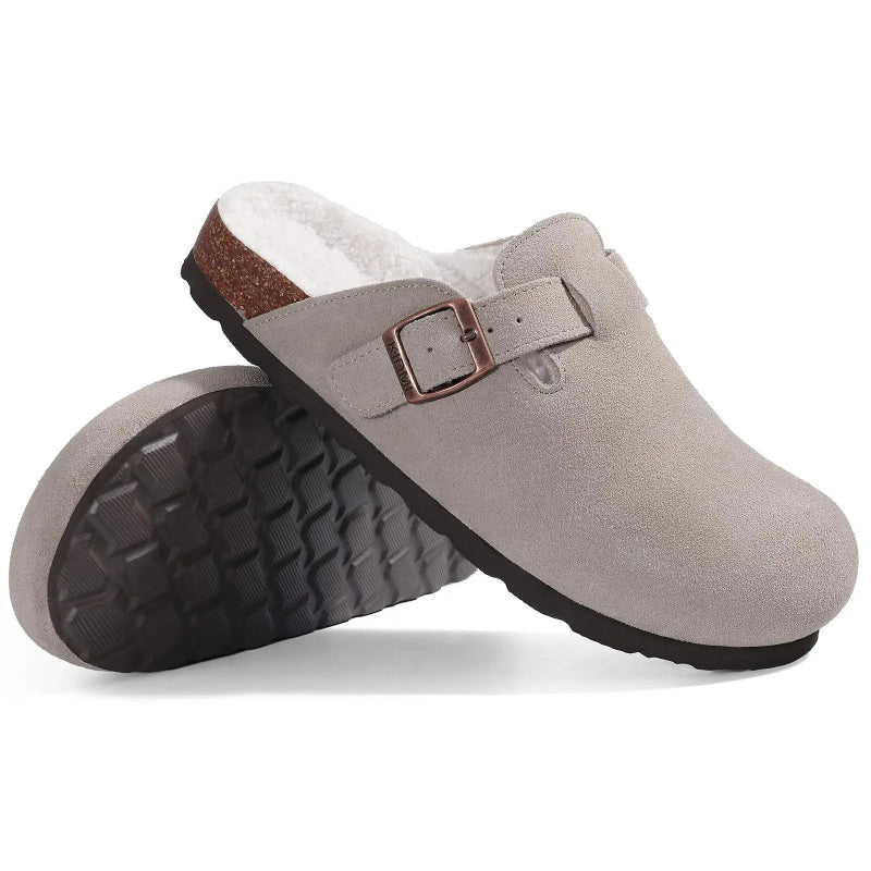 Gray clogs with a brown buckle on a white background