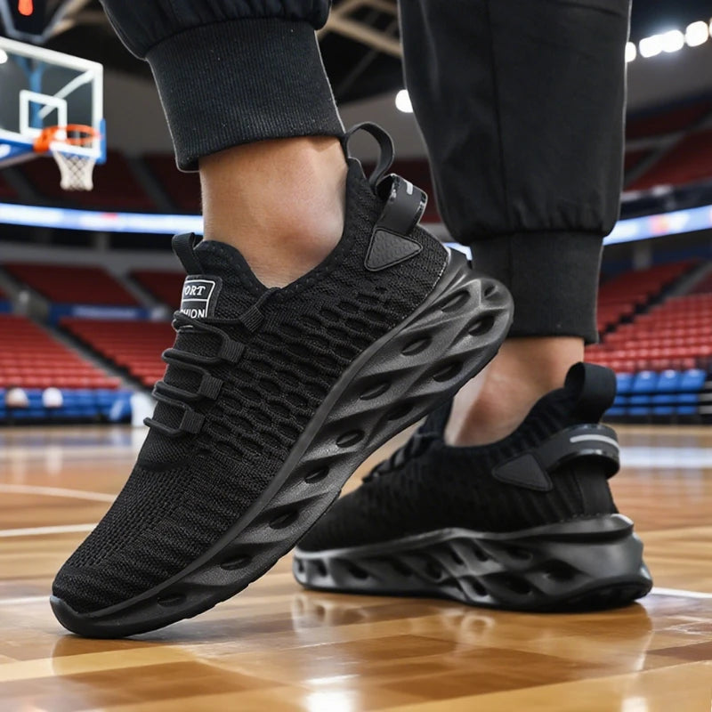 Black sneakers on a basketball court with a blurred background