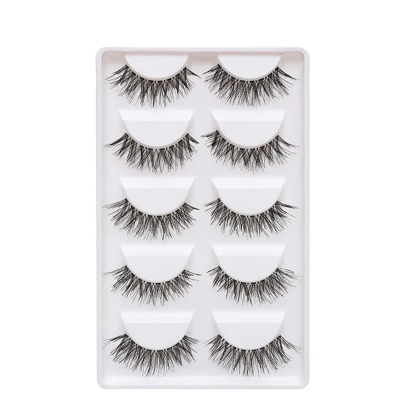 Set of false eyelashes in a clear plastic case on a white background