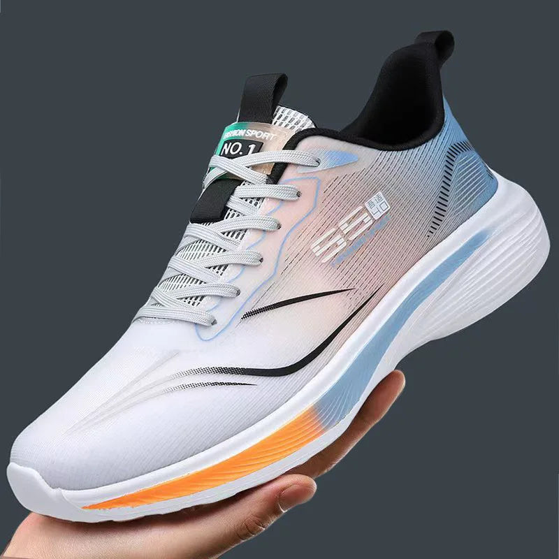 White running shoe with gradient design held by a hand against a dark background